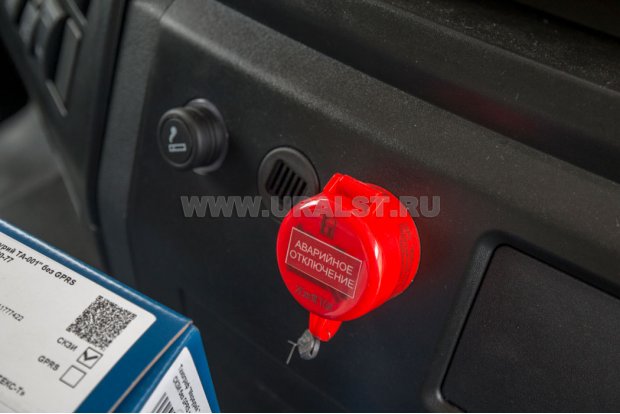 Кнопка аварийного отключеня массы в кабине водителя